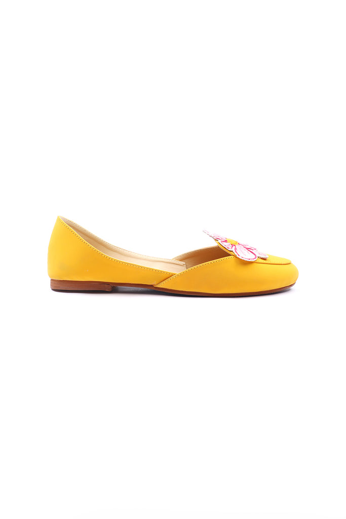 Yellow color khussa style loafer with a applique flower on top